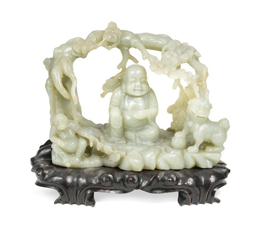 Lot 73 - A Chinese jade-type carving of a Buddha, monkey and lion