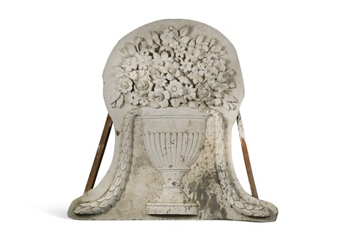 Lot 674 - A plaster relief of a classical urn