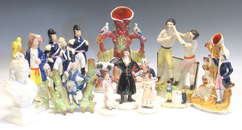 Lot 15 - A group of Staffordshire figures to include...