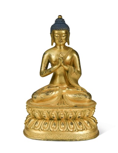 Lot 80 - A Chinese gilt bronze seated figure of the Buddha