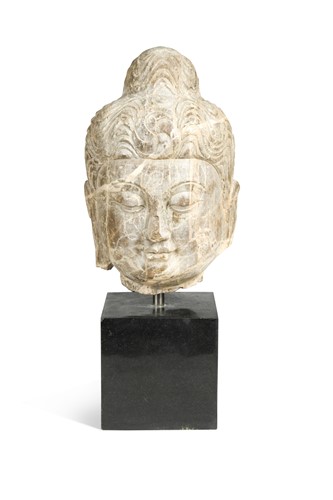 Lot 83 - A marble head of Avalokitesvara, Sui Dynasty style