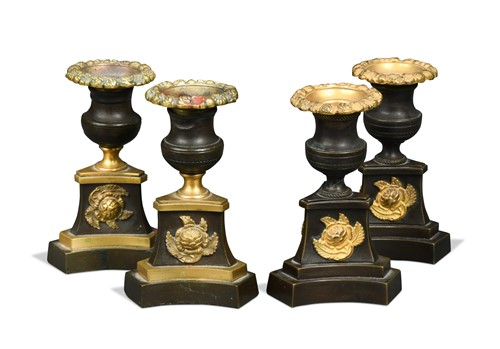 Lot 684 - Two similar pairs of bronze and gilt bronze dwarf candlesticks, 19th century