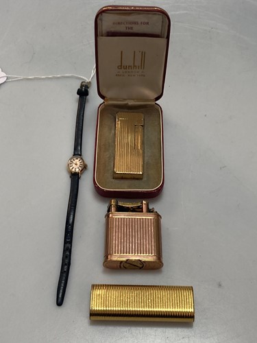 Lot 167 - A Cartier cigarette lighter, a Dunhill...