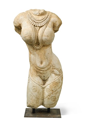 Lot 150 - An Indian carved stone torso of a female deity