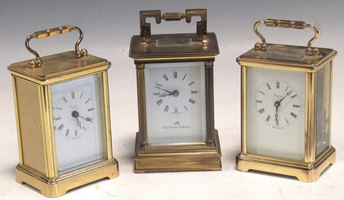 Lot 20 - Two Asprey's gilt brass carriage clocks (one...