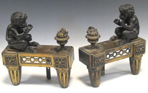 Lot 99 - A pair of bronze and gilt bronze chenets in...