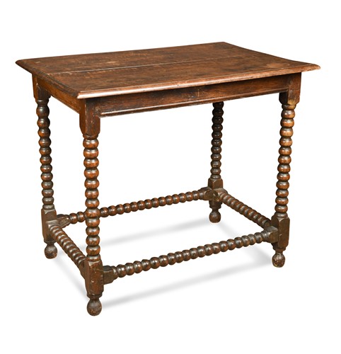 Lot 558 - An oak bobbin turned centre table, early 18th century