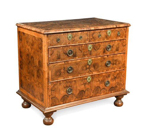 Lot 594 - A William & Mary and later oyster veneered walnut chest of drawers