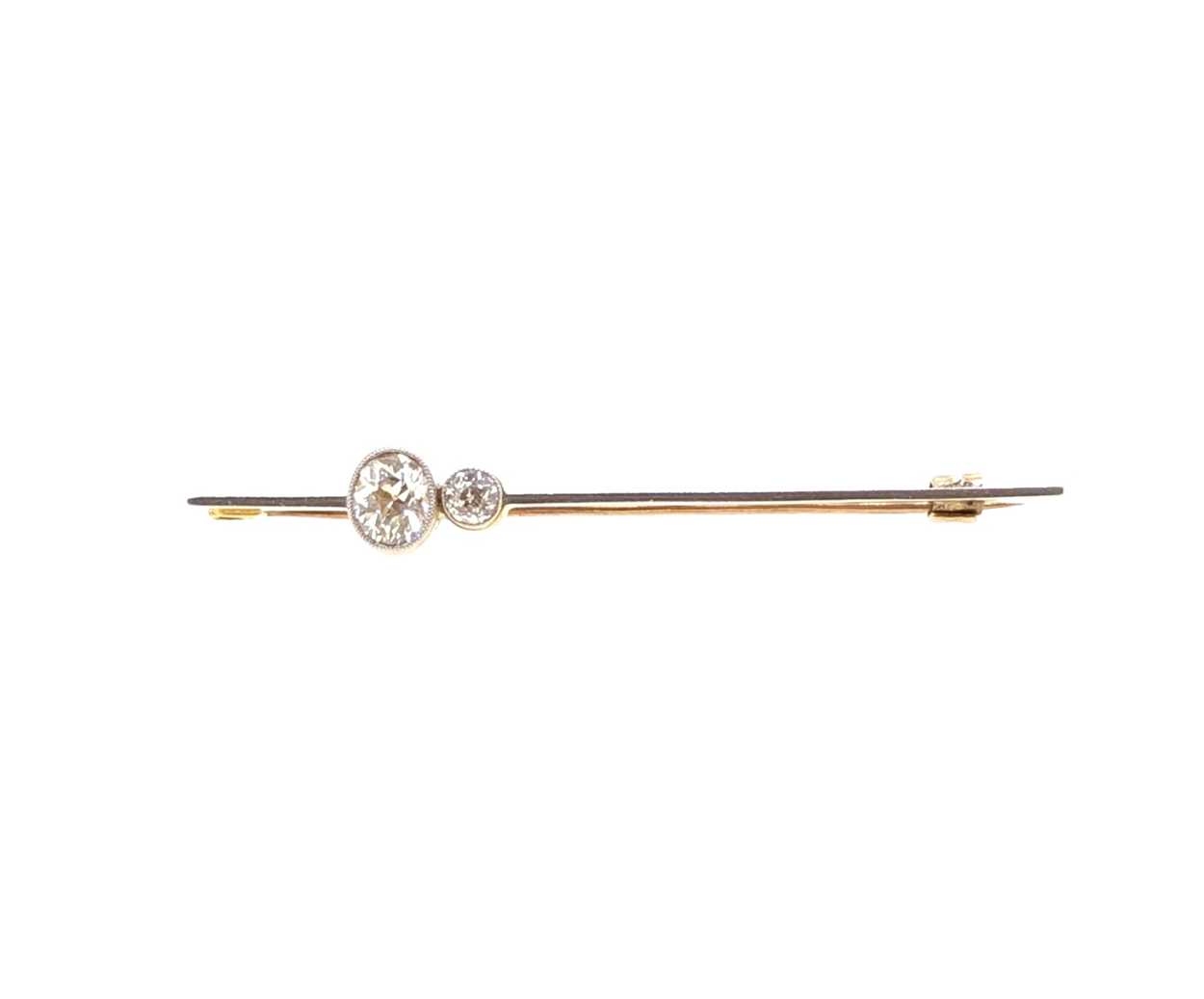 Lot 14 - A diamond set bar brooch