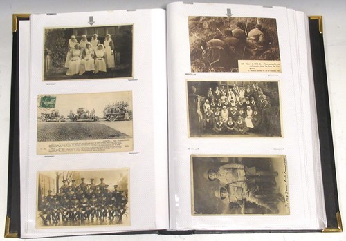 Lot 86 - Large First World War postcard album with 295...