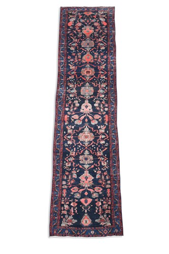 Lot 652 - A long Hamadan runner rug, 20th century