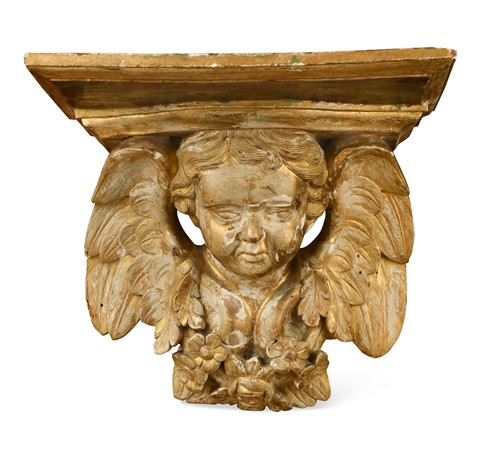 Lot 520 - A carved giltwood wall bracket, 18th century