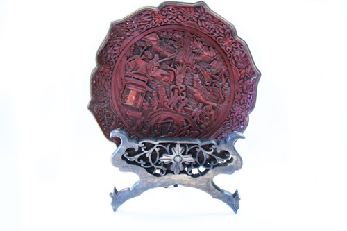 Lot 111 - A Chinese cinnabar lacquered circular shallow dish, late Qing Dynasty