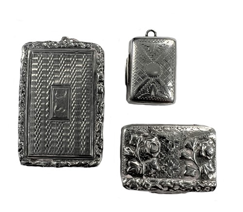 Lot 249 - A group of three George IV silver miniature vinaigrettes