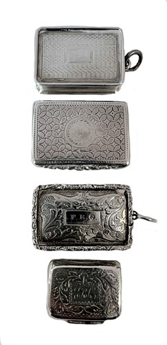 Lot 251 - A group of four William IV silver miniature vinaigrettes