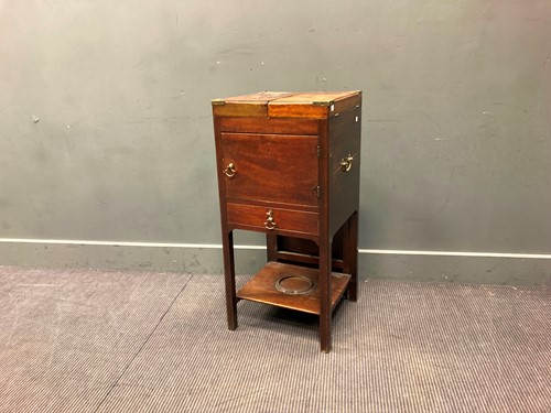 Lot 449 - A mahogany and brass bound campaign type washstand, 19th century