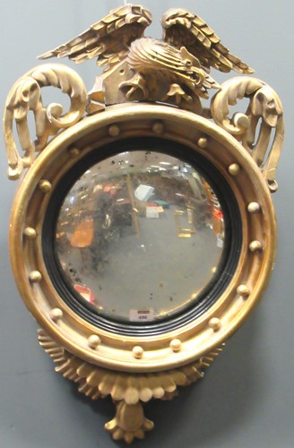 Lot 496 - A Regency and later gilt convex mirror