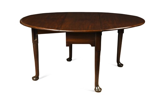 Lot 653 - An early George III Cuban mahogany dining table