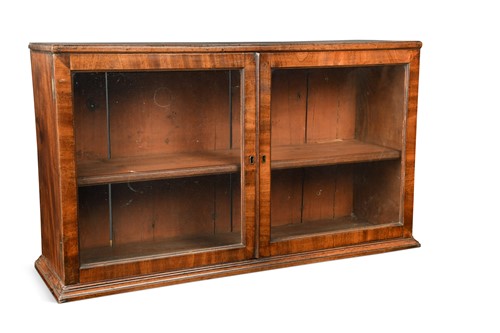 Lot 665 - A George III Cuban mahogany cabinet, early 19th century