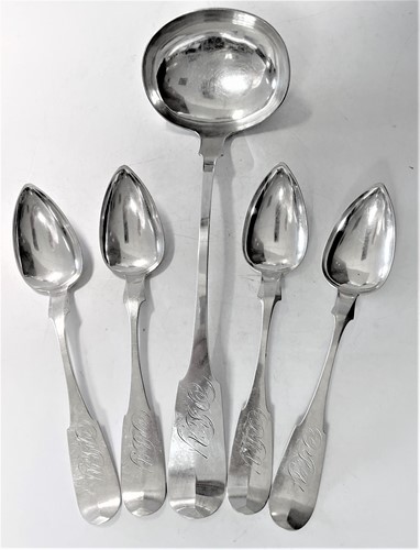 Lot 321 - An American metalwares mid 19th century soup ladle and four tablespoons