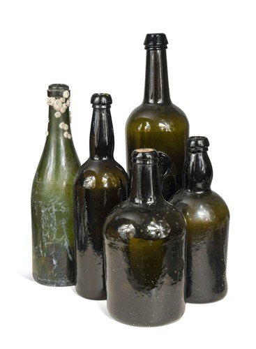 Lot 551 - A collection of four wine bottles, late 18th or early 19th century