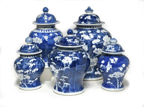 Lot 47 - A group of five Chinese blue and white porcelain vases, Qing Dynasty, 19th century