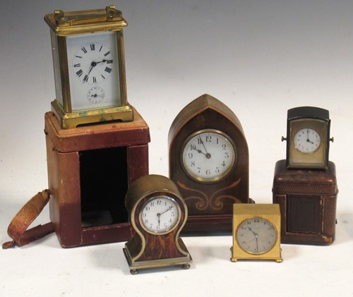 Lot 155 - A brass carriage clock with travelling case, a...