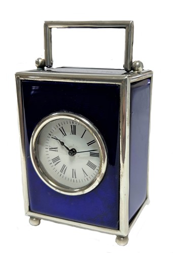 Lot 227 - Barrett & Sons, London - A late 19th century Sterling silver and blue glass boudoir carriage clock
