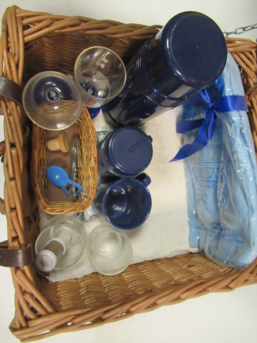 Lot 112 - A Harrods picnic set for two within a wicker...