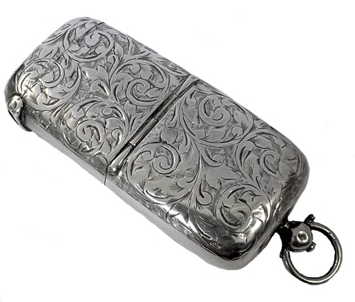 Lot 257 - A Victorian silver combined sovereign holder and vesta case