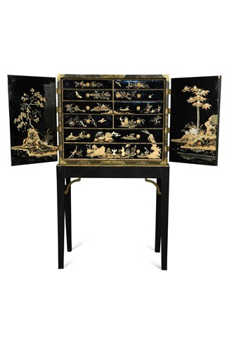 Lot 626 - A Chinese black lacquer cabinet on later stand, 19th century