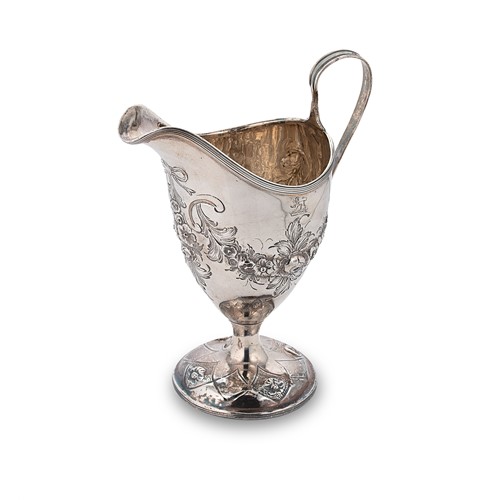 Lot 470 - Dublin - A late 18th century silver helmet shaped cream jug