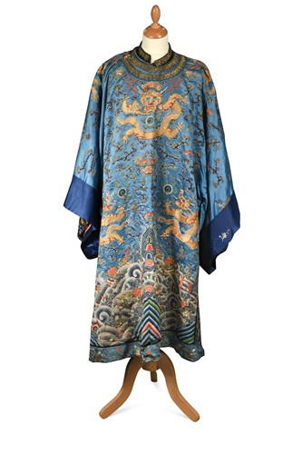 Lot 95 - A blue ground embroidered Dragon robe, late 19th century