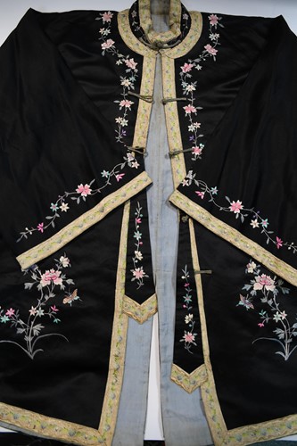 Lot 94 - A Chinese black silk lady's summer jacket, circa 1920