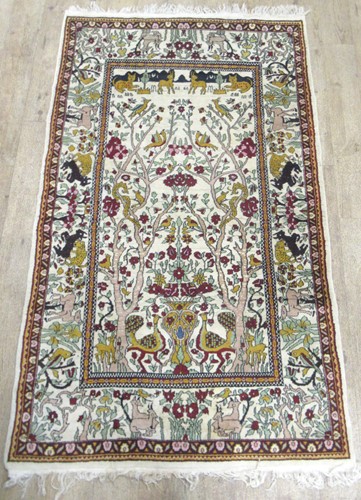 Lot 517 - A pictorial rug, possibly Tabriz, 210 x 120cm