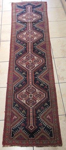 Lot 519 - A Karabakh runner (narrowed), 285 x 78cm