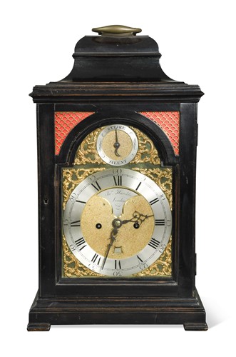 Lot 809 - A George III ebonised bracket clock
