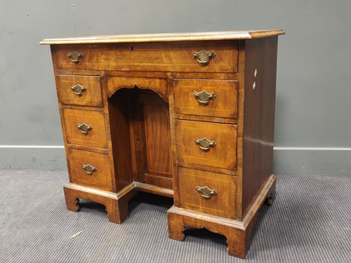 Lot 441 - A 19th century walnut knee hole desk, 76 x 85...