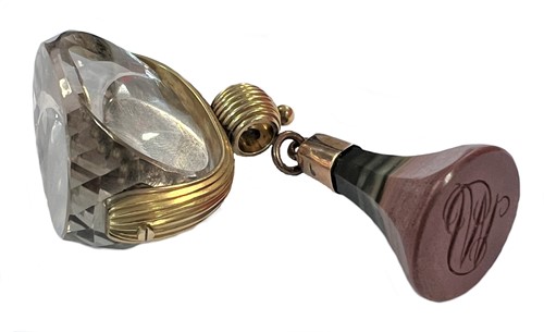 Lot 193 - A rock crystal spinning fob seal, together with a rhodonite example