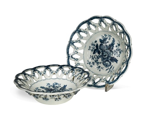 Lot 570 - A pair of small Worcester blue and white circular baskets, circa 1775