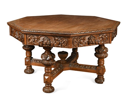 Lot 818 - An octagonal oak library table by Edwards & Roberts, late 19th century