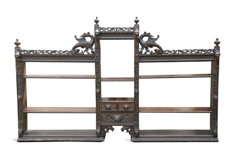 Lot 542 - A carved oak set of open shelves, 19th century