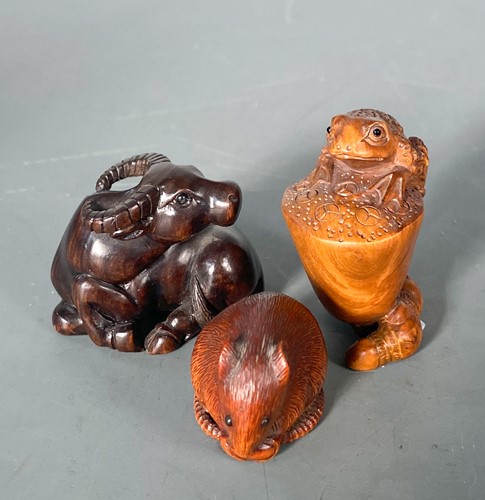 Lot 92 - Three Japanese carved wood netsukes, 20th century