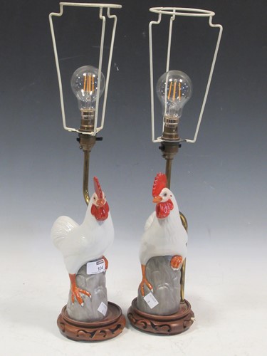 Lot 134 - A pair of lamps modeled as chickens