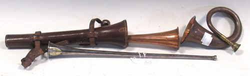 Lot 55 - A copper and brass hunting horn in a fitted...