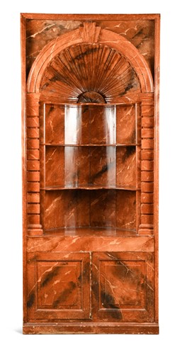 Lot 542 - A George III barrel back floor standing corner cupboard