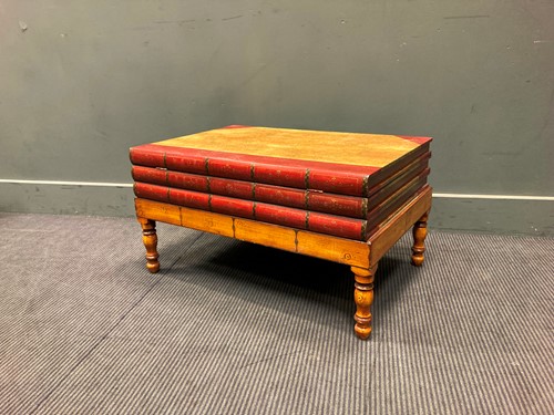 Lot 365 - A faux book coffee table, 20th century, 40 x...