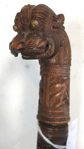 Lot 44A - An Indian carved handle walking cane with...