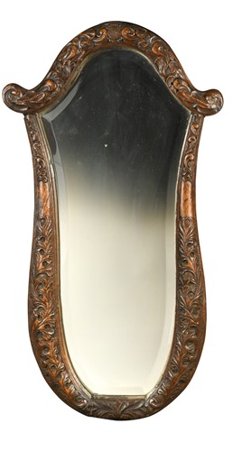 Lot 531 - A Continental carved walnut wall mirror, 19th century