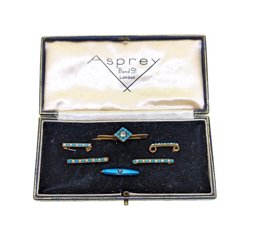 Lot 51 - A group of turquoise and pearl brooches